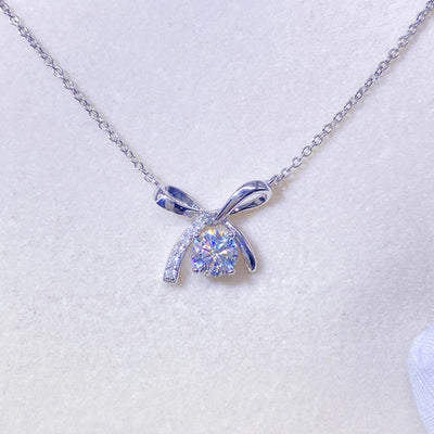 https://javiergems.com/products/925-sterling-silver-vvs1-moissanite-butterfly-row-necklace™