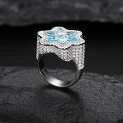 https://javiergems.com/products/925-sterling-silver-vvs1-moissanite-blue-flower-ring™