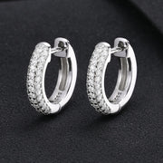 https://javiergems.com/products/925-sterling-silver-vvs1-moissanite-1-5mm-earrings™