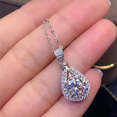 https://javiergems.com/products/925-sterling-silver-vvs1-moissanite-5ct-water-drop-necklace™