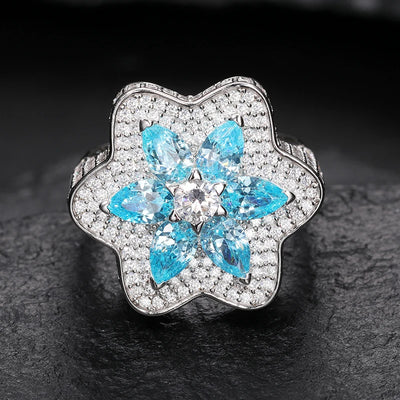 https://javiergems.com/products/925-sterling-silver-vvs1-moissanite-blue-flower-ring™