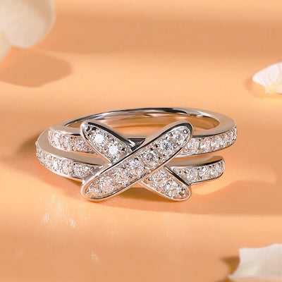 https://javiergems.com/products/925-sterling-silver-vvs1-moissanite-cross-connection-ring™
