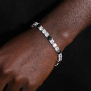 https://javiergems.com/products/925-sterling-silver-vvs1-moissanite-tennis-bracelet-with-black-diamond™