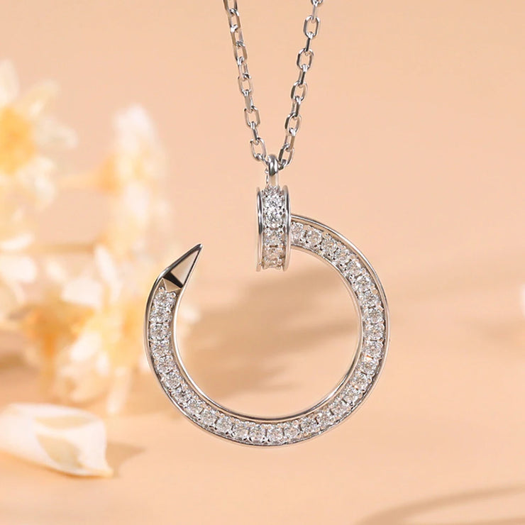 https://javiergems.com/products/925-sterling-silver-vvs1-moissanite-nail-necklace™