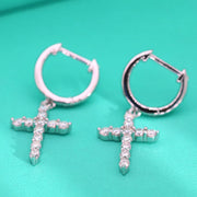 https://javiergems.com/products/925-sterling-silver-vvs1-moissanite-2mm-cross-earrings™