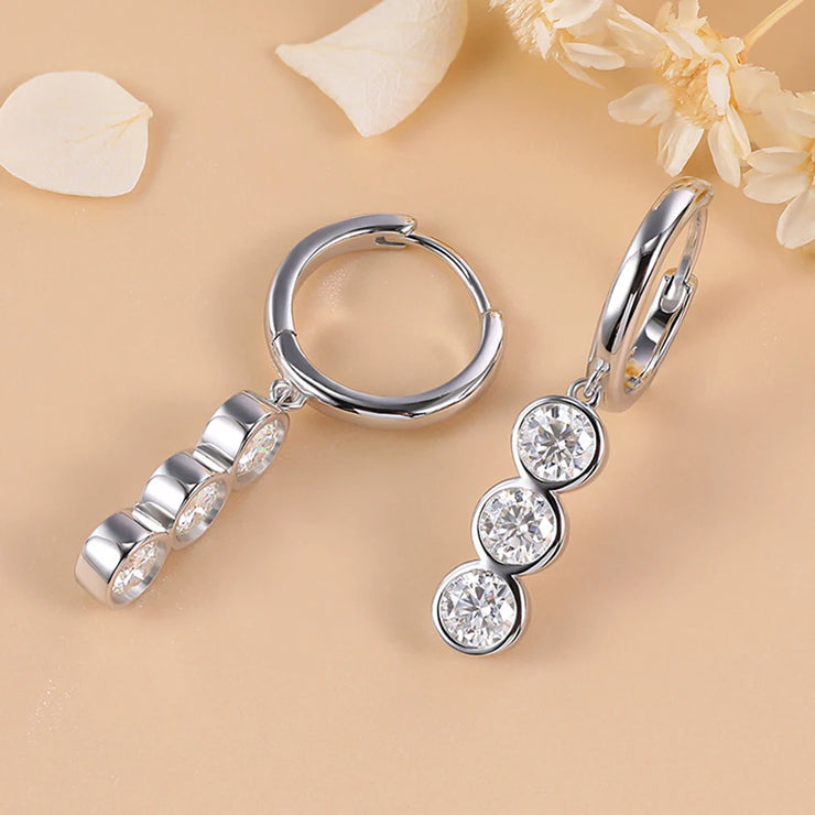 https://javiergems.com/products/925-sterling-silver-vvs1-moissanite-triple-diamonds-earrings™